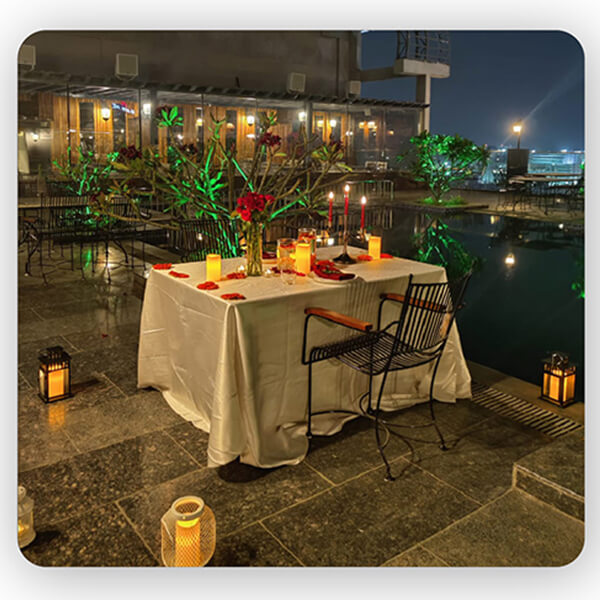 Pool Side Candle Light Dinner with Elegant Setup by Le Meridian  2